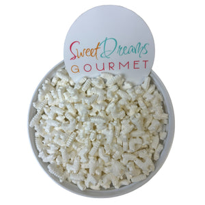 a bowl filled with white rice next to a sign that says sweet dreams gour