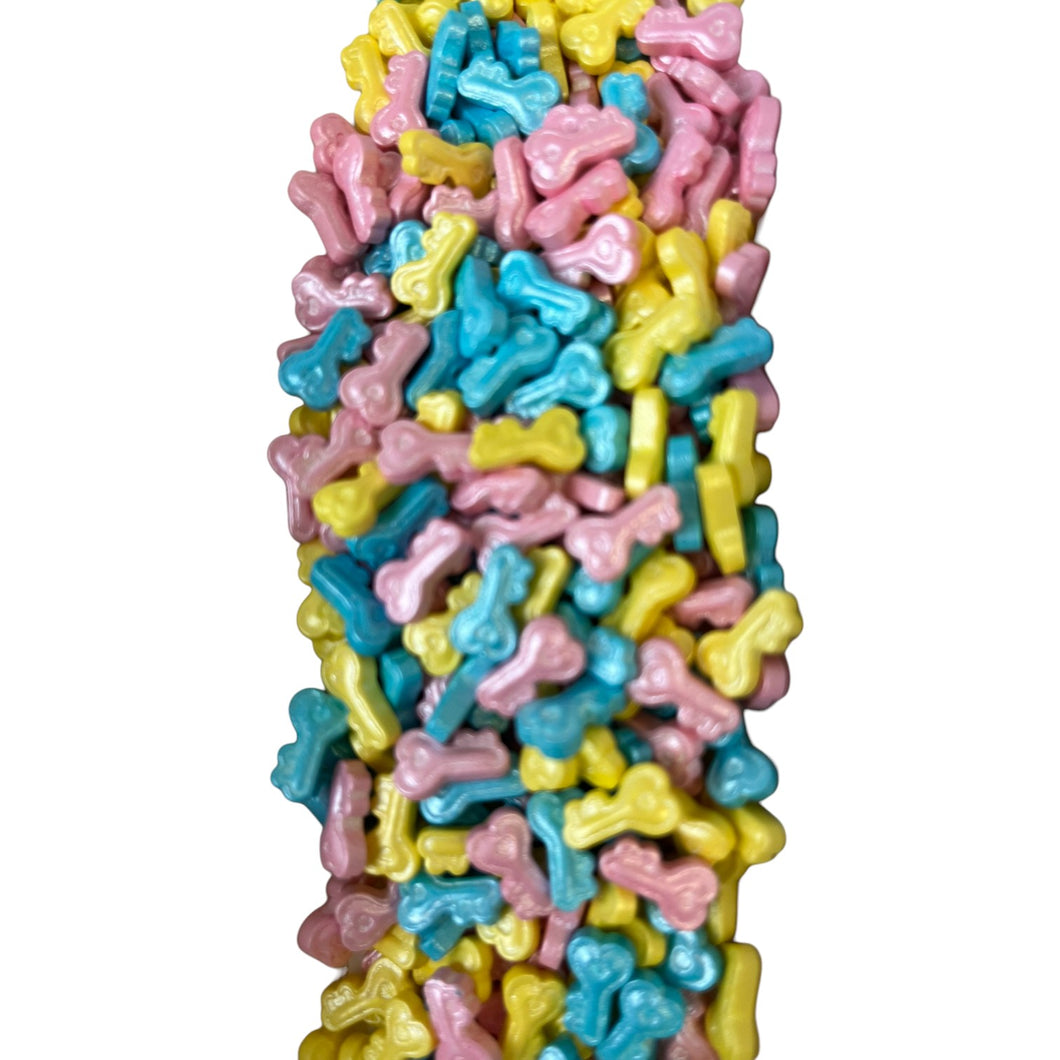 a large pile of colorful candy sprinkles on a white background