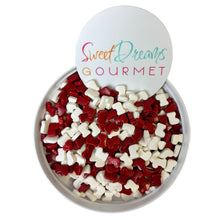 a bowl filled with red and white candies