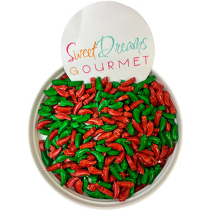 a bowl filled with red and green peppers