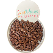 a bowl of dog food with a sign that says sweet dreams gourmet