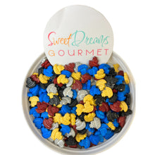 a bowl of gummy bears with a sign that says sweet dreams gourmet