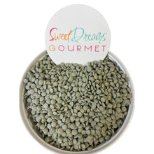 a bowl filled with green beans and a sign that says sweet dreams gourmet