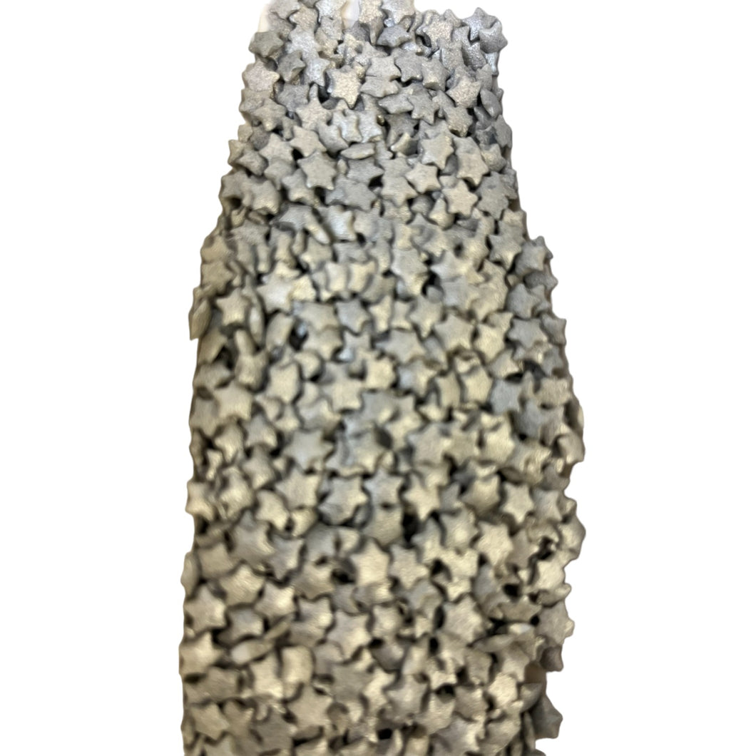 a close up of a vase made out of rocks