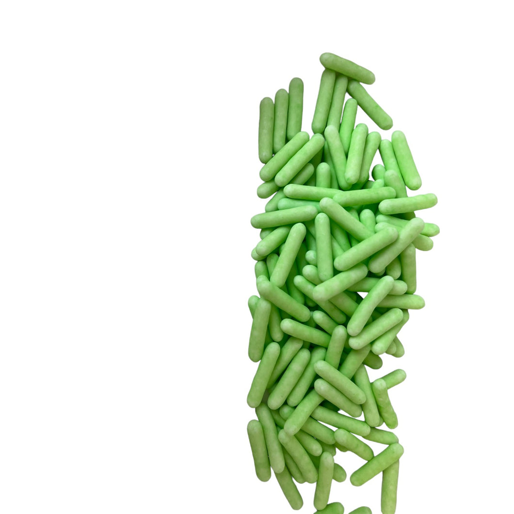 a pile of green beans on a white background