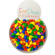 a bowl filled with lots of colorful candy