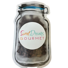 a jar with a label that says sweet dreams gourmet