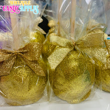 a close up of some candy apples wrapped in plastic