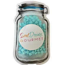 a jar filled with lots of blue candy