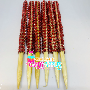 a close up of a bunch of toothpicks with beads on them