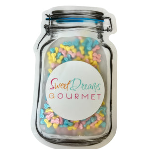 a jar filled with lots of different colored sprinkles