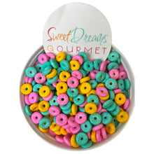 a bowl filled with lots of colorful donuts