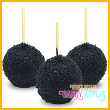 a couple of black balls with sticks sticking out of them