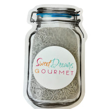 a jar with a sticker that says sweet dreams gourmet