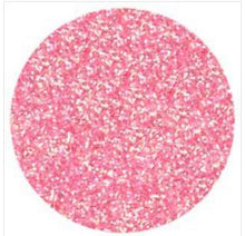 a pink glitter disc on a white background