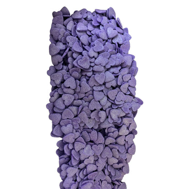 a pile of purple rocks on a white background