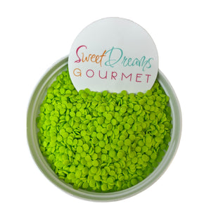 a bowl of green beans with a sign that says sweet dreams gourmet