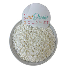 a bowl filled with white rice next to a sign that says sweet dreams gour