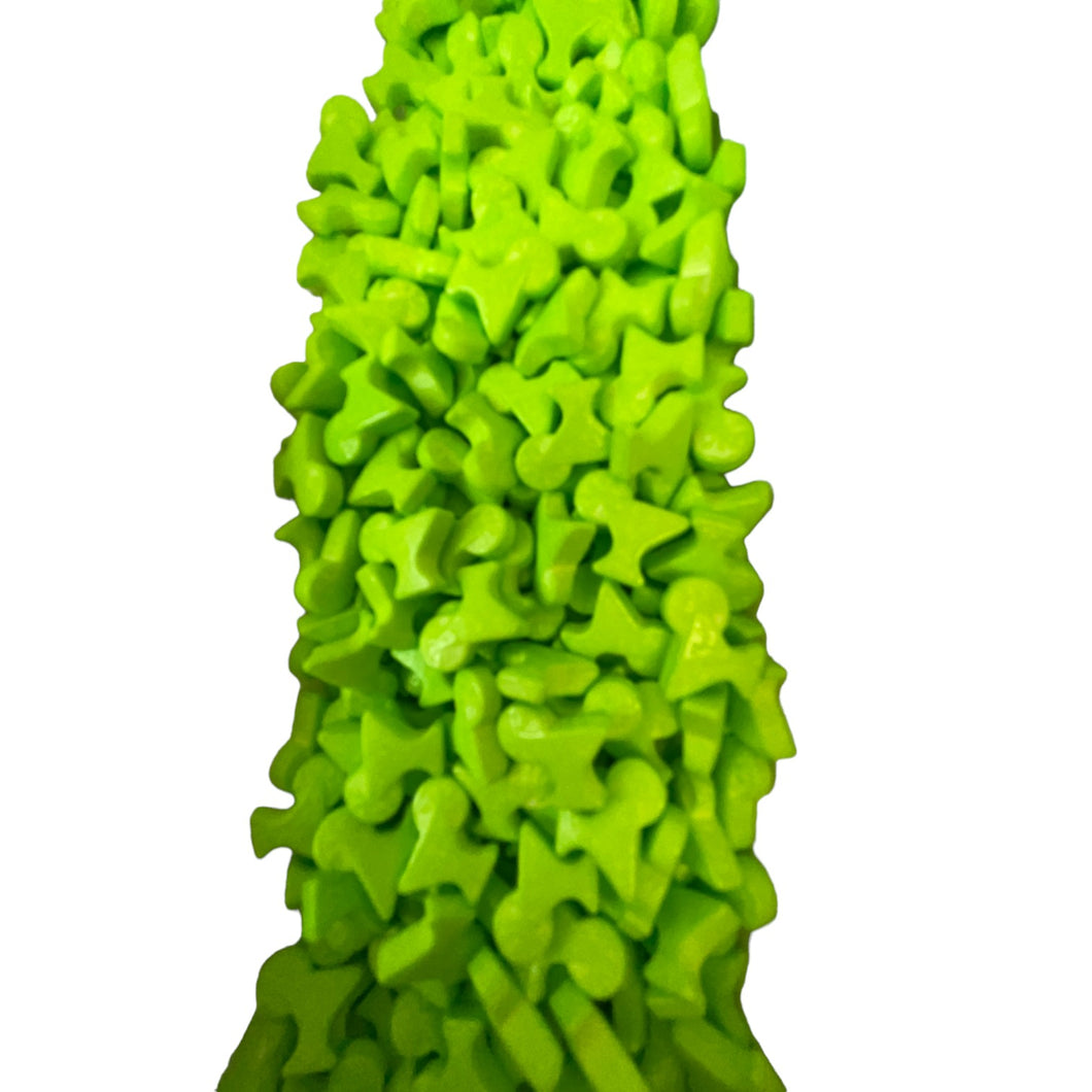 a large green object made out of small pieces of plastic