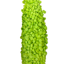 a vase made of green peas on a white background