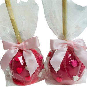 a couple of bags filled with valentine's day treats