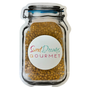 a jar with a label that says sweet dreams gourmet