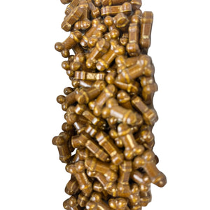 a pile of brown pills sitting on top of each other