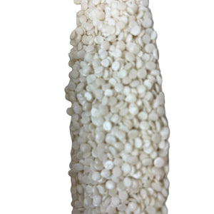 a white vase with a lot of white beads on it