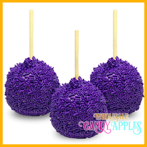 three purple cake pops sitting on top of each other