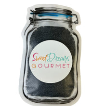 a jar with a sticker that says sweet dreams gourmet