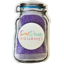 a jar of purple sugar with a sticker that says sweet dreams gourmet