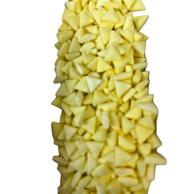 a close up of a pile of cheese on a white background