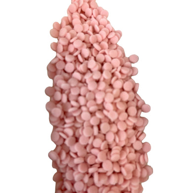 a pink object made out of small pebbles