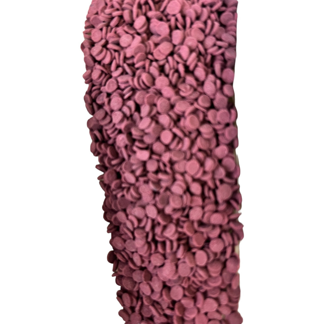 a vase made out of pink pebbles on a white background