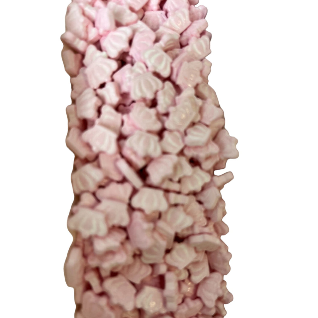 a pink and white candy bar with white frosting