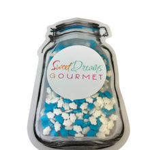 a jar filled with blue and white candies