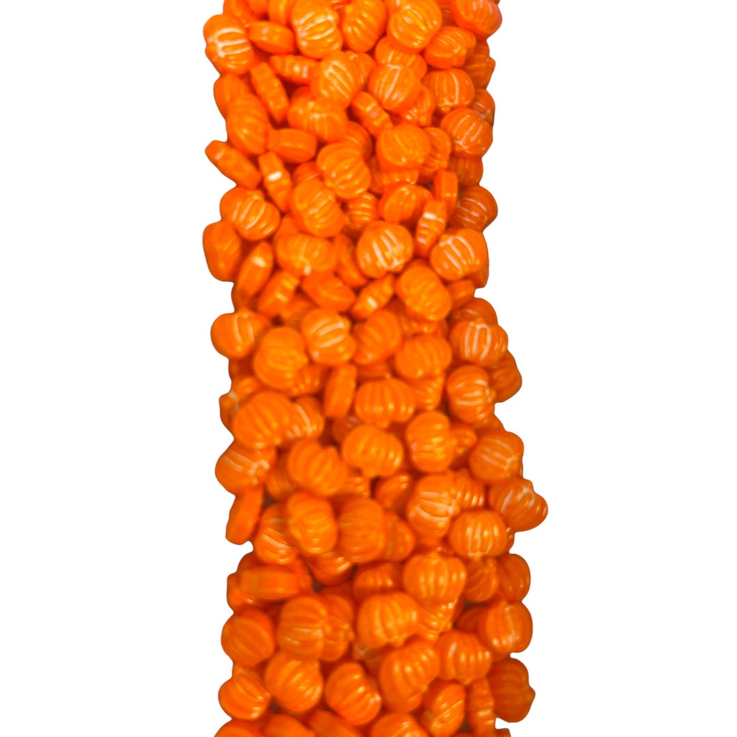 a bunch of orange candies stacked on top of each other