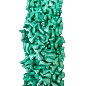 a large pile of green plastic objects against a white background