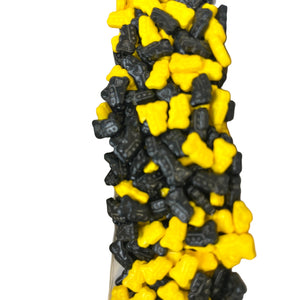 a bunch of yellow and black legos sitting on top of each other