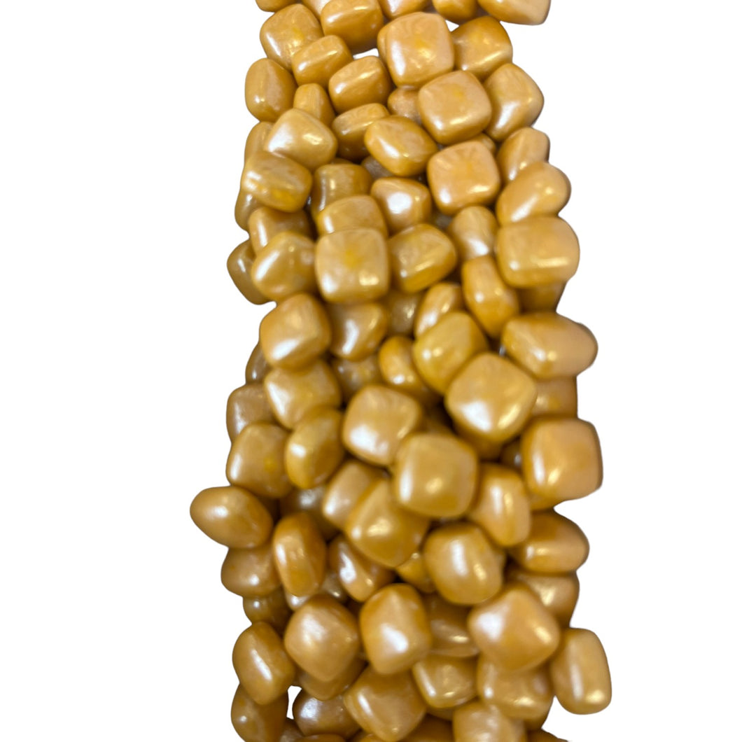 a pile of corn on a white background