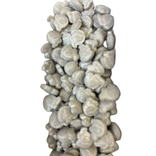 a sculpture of rocks is shown against a white background