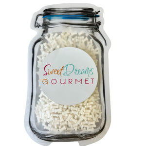 a jar filled with white rice sitting on top of a table