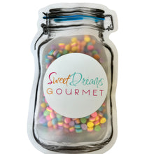 a jar filled with lots of colorful candy