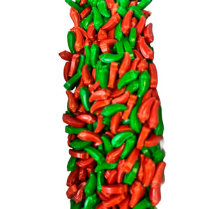 a large pile of red and green peppers