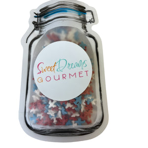 a jar filled with red, white and blue sprinkles